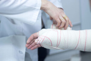 injured arm in cast